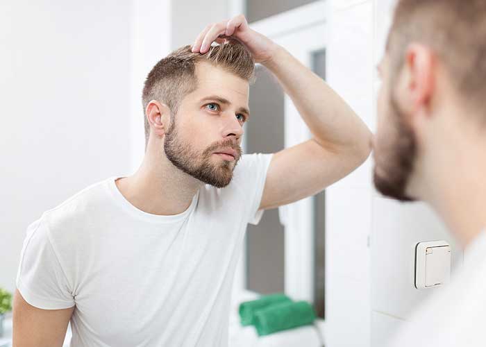 At What Age Do Men Start To Lose Their Hair?